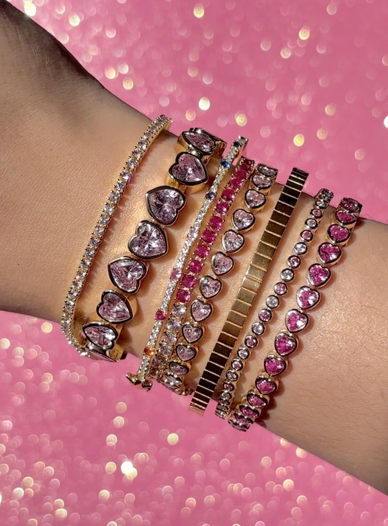 Pulsera de tenis con corazón y bisel rosa