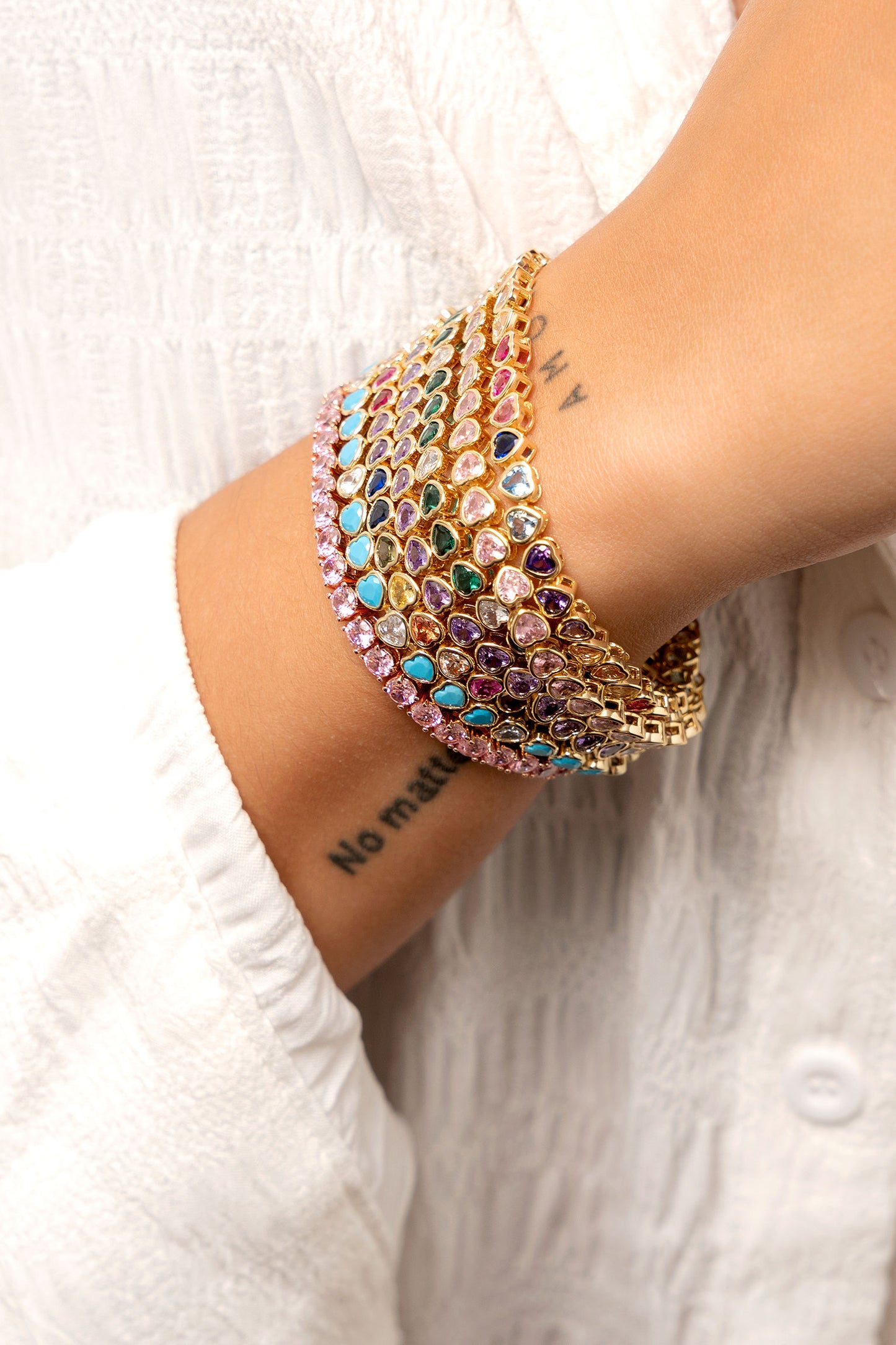 Pulsera de tenis con corazón en bisel morado