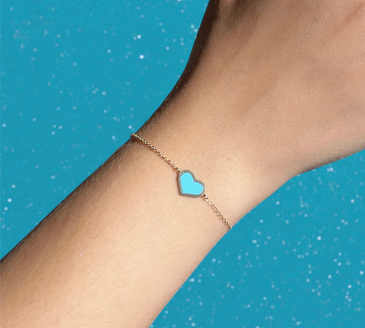 Pulsera de oro 14k con un corazón de turquesa